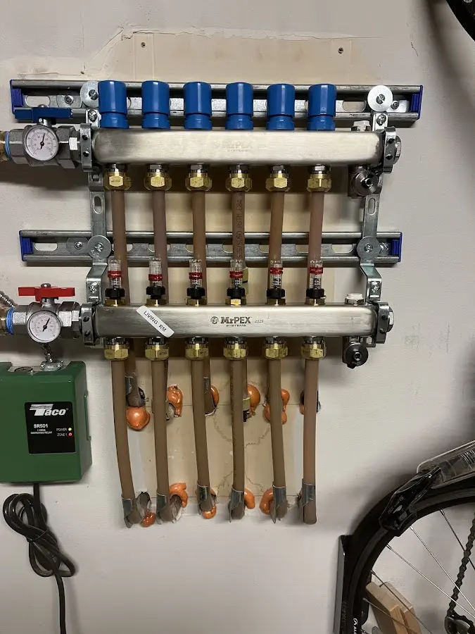 Plumber performing Leak Detection at a residential property in Hartford